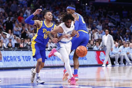 Mar 15, 2024; Washington, D.C., USA; North Carolina Tar Heels guard RJ Davis (4) looses control of the ball as Pittsburgh Panthers guard Jaland Lowe (15) and Panthers forward Blake Hinson (2) defend during the first half at Capital One Arena. Mandatory Credit: Amber Searls-USA TODAY Sports