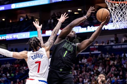 Mar 15, 2024; New Orleans, Louisiana, USA;  New Orleans Pelicans forward Zion Williamson (1) drives to the basket against LA Clippers guard Amir Coffey (7) during the first half at Smoothie King Center. Mandatory Credit: Stephen Lew-USA TODAY Sports