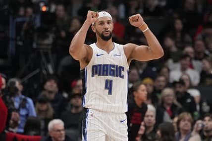 Mar 15, 2024; Toronto, Ontario, CAN; Orlando Magic guard Jalen Suggs (4) celebrates a play against the Toronto Raptors during the second half at Scotiabank Arena. Mandatory Credit: John E. Sokolowski-USA TODAY Sports