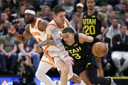 Mar 15, 2024; Salt Lake City, Utah, USA; Utah Jazz guard Keyonte George (3) drives against Atlanta Hawks guard Vit Krejci (27) during the second quarter at Delta Center. Mandatory Credit: Rob Gray-USA TODAY Sports