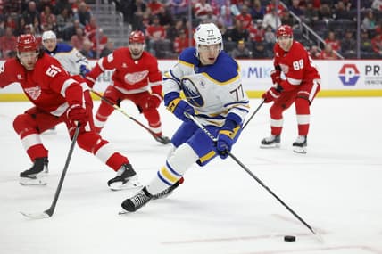 Mar 16, 2024; Detroit, Michigan, USA;  Buffalo Sabres right wing JJ Peterka (77) skates with the puck in the first period against the Detroit Red Wings at Little Caesars Arena. Mandatory Credit: Rick Osentoski-USA TODAY Sports