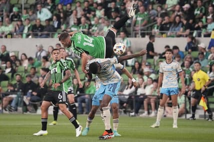 Mar 16, 2024; Austin, Texas, USA; Austin FC forward Diego Rubio (14) and Philadelphia Union defender Damion Lowe (17) collide in the first half at Q2 Stadium. Mandatory Credit: Scott Wachter-USA TODAY Sports
