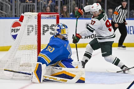 Mar 16, 2024; St. Louis, Missouri, USA;  Minnesota Wild left wing Kirill Kaprizov (97) shoots and scores the game tying goal against St. Louis Blues goaltender Jordan Binnington (50) during the third period at Enterprise Center. Mandatory Credit: Jeff Curry-USA TODAY Sports