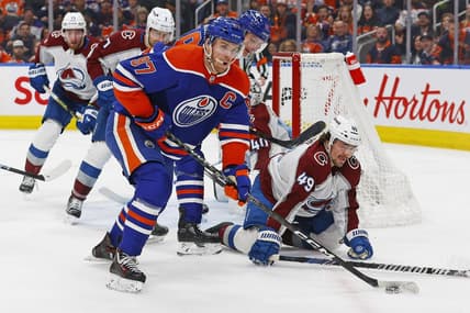Mar 16, 2024; Edmonton, Alberta, CAN; Edmonton Oilers forward Connor McDavid (97) looks to make a pass in front of Colorado Avalanche defensemen Sam Girard (49) during the first period at Rogers Place. Mandatory Credit: Perry Nelson-USA TODAY Sports