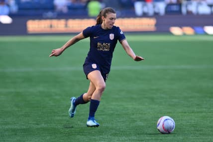 Mar 17, 2024; Seattle, Washington, USA; Seattle Reign defender Sofia Huerta  (11) moves the ball against the Washington Spirit during the second half at Lumen Field. Mandatory Credit: Steven Bisig-USA TODAY Sports