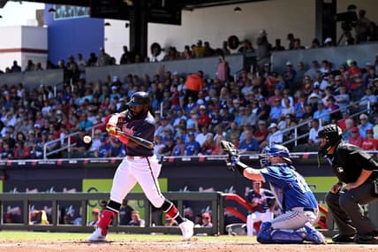 Mar 20, 2024; North Port, Florida, USA; Atlanta Braves center fielder Michael Harris III (23) gets on base with a fielders choice in the second inning of a spring training game against the Toronto Blue Jays  at CoolToday Park. Mandatory Credit: Jonathan Dyer-USA TODAY Sports