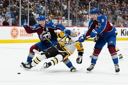 Mar 24, 2024; Denver, Colorado, USA; Colorado Avalanche center Nathan MacKinnon (29) and Colorado Avalanche defenseman Cale Makar (8) defend on Pittsburgh Penguins center Lars Eller (20) in the first period at Ball Arena. Mandatory Credit: Ron Chenoy-USA TODAY Sports