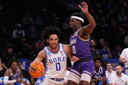 Mar 24, 2024; Brooklyn, NY, USA; Duke Blue Devils guard Jared McCain (0) dribbles the ball past James Madison Dukes guard Xavier Brown (0) in the second round of the 2024 NCAA Tournament  at Barclays Center. Mandatory Credit: Robert Deutsch-USA TODAY Sports
