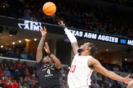 Texas A&M's Wade Taylor IV (4) shoots the ball during the second round game between Texas A&M and the University of Houston in the 2024 NCAA Tournament at FedExForum in Memphis, Tenn., on Sunday, March 24, 2024.