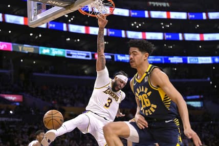Mar 24, 2024; Los Angeles, California, USA;   Los Angeles Lakers forward Anthony Davis (3) reacts after he gets past Indiana Pacers guard Ben Sheppard (26) for a dunk in the second half at Crypto.com Arena. Mandatory Credit: Jayne Kamin-Oncea-USA TODAY Sports