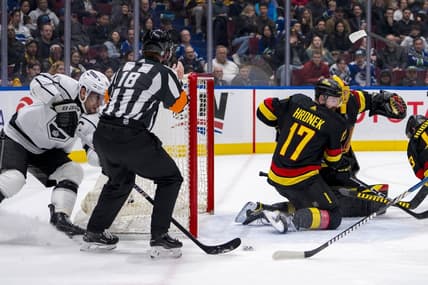 Mar 25, 2024; Vancouver, British Columbia, CAN; Vancouver Canucks defenseman Filip Hronek (17) watches as Los Angeles Kings forward Anze Kopitar (11) scores on goalie Casey DeSmith (29) in the second period at Rogers Arena. Mandatory Credit: Bob Frid-USA TODAY Sports