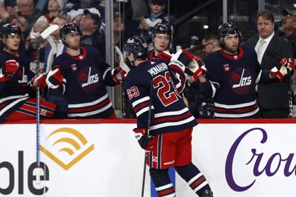 Mar 28, 2024; Winnipeg, Manitoba, CAN; Winnipeg Jets center Sean Monahan (23) celebrates his second period goal against the Vegas Golden Knights at Canada Life Centre. Mandatory Credit: James Carey Lauder-USA TODAY Sports