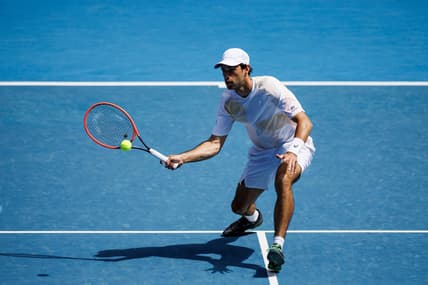 Jan 22, 2024; Melbourne, Victoria, Australia; Nuno Borges of Portugal hits a shot against Daniil Medvedev of Russia in the fourth round of the men   s singles at the Australian Open in MelbourneMandatory Credit: Mike Frey-USA TODAY Sports