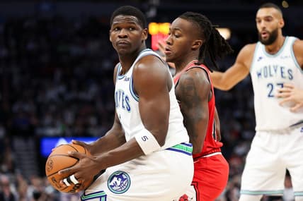 Mar 31, 2024; Minneapolis, Minnesota, USA; Minnesota Timberwolves guard Anthony Edwards (5) works around Chicago Bulls guard Ayo Dosunmu (12) during the first half at Target Center. Mandatory Credit: Matt Krohn-USA TODAY Sports