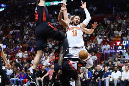 Apr 2, 2024; Miami, Florida, USA; New York Knicks guard Jalen Brunson (11) reacts after driving to the basket against Miami Heat forward Caleb Martin (16) during the first quarter at Kaseya Center. Mandatory Credit: Sam Navarro-USA TODAY Sports