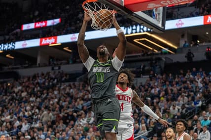 Apr 2, 2024; Minneapolis, Minnesota, USA; Minnesota Timberwolves center Naz Reid (11) dunks over Houston Rockets guard Jalen Green (4) in the second quarter at Target Center. Mandatory Credit: Matt Blewett-USA TODAY Sports