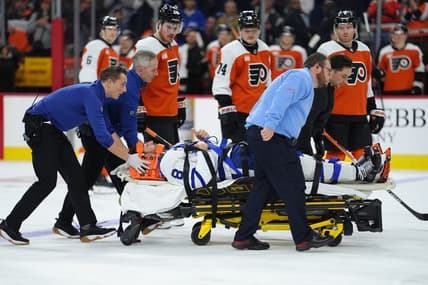 NHL: Chris Tanev taken off ice on stretcher, Toronto Maple Leafs at Philadelphia Flyers