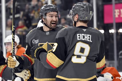 Vegas Golden Knights right wing Mark Stone, left, celebrates with center Jack Eichel (9) after scoring against the Philadelphia Flyers during the second period of an NHL hockey game Thursday, Jan. 2, 2025, in Las Vegas. (AP Photo/David Becker)