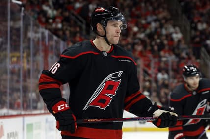 Carolina Hurricanes' Mikko Rantanen (96) waits for a face-off against the Chicago Blackhawks during the second period of an NHL hockey game in Raleigh, N.C., Sunday, Feb. 2, 2025. (AP Photo/Karl DeBlaker)