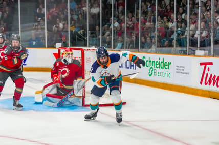 New York Sirens forward Elle Hartje skates away from Ottawa Charge goalie Gwyneth Philips during a 5-1 loss at TD Place.
