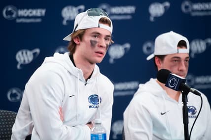 Penn State's Gavin McKenna, left, answers a question during a post-game press conference following a Big Ten hockey game against