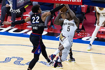 May 7, 2021; Philadelphia, Pennsylvania, USA; New Orleans Pelicans guard Eric Bledsoe (5) attempts to pass the ball pasts Philadelphia 76ers guard Matisse Thybulle (22) during the second quarter at Wells Fargo Center. Mandatory Credit: Bill Streicher-USA TODAY Sports