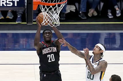 May 8, 2021; Salt Lake City, Utah, USA; Houston Rockets guard Khyri Thomas (20) drives to the basket against Utah Jazz guard Jordan Clarkson (00) in the second quarter at Vivint Arena. Mandatory Credit: Rob Gray-USA TODAY Sports