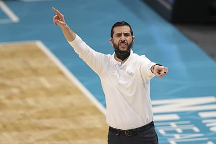 May 9, 2021; Charlotte, North Carolina, USA; Charlotte Hornets coach James Borrego directs his team against the New Orleans Pelicans in the second half at Spectrum Center. Mandatory Credit: Nell Redmond-USA TODAY Sports