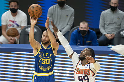 May 11, 2021; San Francisco, California, USA; Golden State Warriors guard Stephen Curry (30) shoots the basketball against Phoenix Suns forward Jae Crowder (99) during the fourth quarter at Chase Center. Mandatory Credit: Kyle Terada-USA TODAY Sports