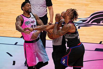 May 13, 2021; Miami, Florida, USA; Miami Heat forward Udonis Haslem (40) and Philadelphia 76ers center Dwight Howard (39) get into an altercation during the first half at American Airlines Arena. Mandatory Credit: Jasen Vinlove-USA TODAY Sports