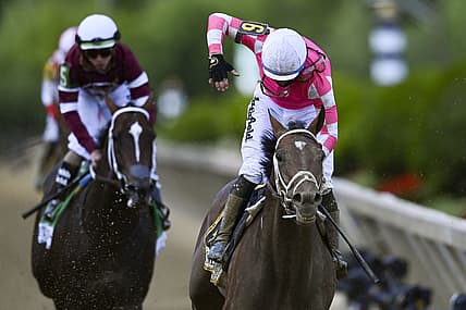 May 15, 2021; Baltimore, Maryland, USA; Flavien Prat aboard  Rombauer reacts after winning the  146th running of the Preakness Stakes at Pimlico Race Course. Mandatory Credit: Tommy Gilligan-USA TODAY Sports