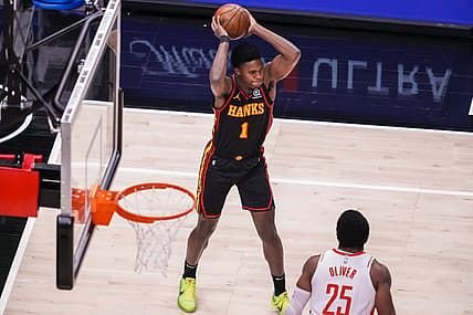 May 16, 2021; Atlanta, Georgia, USA; Atlanta Hawks forward Nathan Knight (1) passes the ball against the Houston Rockets during the first half at State Farm Arena. Mandatory Credit: Dale Zanine-USA TODAY Sports