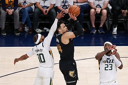 May 23, 2021; Salt Lake City, Utah, USA;  Memphis Grizzlies forward Dillon Brooks (24) is fouled from behind by Utah Jazz guard Mike Conley (10) white shooting during the second quarter at Vivint Arena. Mandatory Credit: Chris Nicoll-USA TODAY Sports