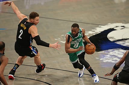 May 25, 2021; Brooklyn, New York, USA; Boston Celtics point guard Kemba Walker (8) drives to the basket against Brooklyn Nets power forward Blake Griffin (2) during the first quarter of game two of the first round of the 2021 NBA Playoffs at Barclays Center. Mandatory Credit: Brad Penner-USA TODAY Sports