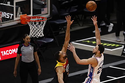 Feb 15, 2021; Salt Lake City, Utah, USA; Philadelphia 76ers guard Ben Simmons (25) shoots over Utah Jazz center Rudy Gobert (27) in the third quarter at Vivint Smart Home Arena. Mandatory Credit: Jeffrey Swinger-USA TODAY Sports