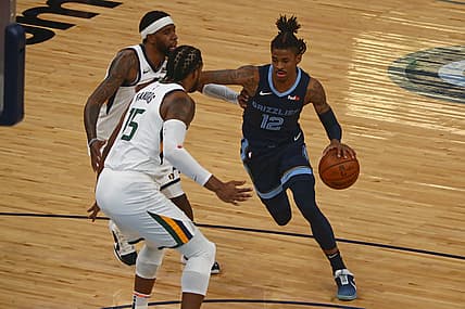 May 31, 2021; Memphis, Tennessee, USA; Memphis Grizzlies guard Ja Morant (12) drives to the basket during the first quarter during game four in the first round of the 2021 NBA Playoffs against the Utah Jazz at FedExForum. Mandatory Credit: Petre Thomas-USA TODAY Sports