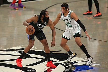 Jun 1, 2021; Brooklyn, New York, USA; Brooklyn Nets shooting guard James Harden (13) controls the ball against Boston Celtics shooting guard Romeo Langford (45) during the first quarter of game five of the first round of the 2021 NBA Playoffs at Barclays Center. Mandatory Credit: Brad Penner-USA TODAY Sports