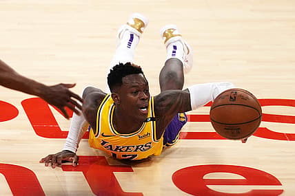 Jun 3, 2021; Los Angeles, California, USA; Los Angeles Lakers guard Dennis Schroder (17) reaches for the ball against the Phoenix Suns in the second half during game six in the first round of the 2021 NBA Playoffs at Staples Center. Mandatory Credit: Kirby Lee-USA TODAY Sports