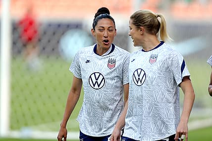 Jun 10, 2021; Houston, Texas, USA; United States forward Christen Press (23, left) and defender Abby Dahlkemper (7) take the field for warmups prior to the match against Portugal during a WNT Summer Series international friendly soccer match at BBVA Stadium. Mandatory Credit: Erik Williams-USA TODAY Sports