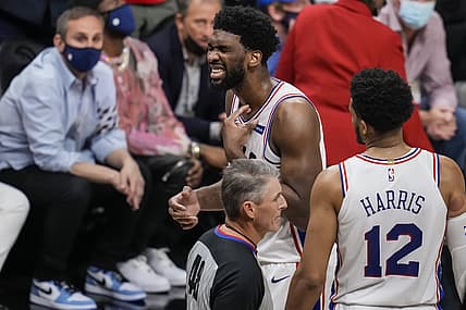 Jun 18, 2021; Atlanta, Georgia, USA; Philadelphia 76ers center Joel Embiid (21) reacts after being injured in a collision with Atlanta Hawks forward John Collins (20) (not shown) during the second half during game six in the second round of the 2021 NBA Playoffs. at State Farm Arena. Mandatory Credit: Dale Zanine-USA TODAY Sports