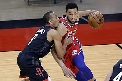 May 5, 2021; Houston, Texas, USA; Philadelphia 76ers guard Ben Simmons, right, drives into Houston Rockets guard Avery Bradley (9) during the first half at Toyota Center. Mandatory Credit:  Michael Wyke/POOL PHOTOS-USA TODAY Sports