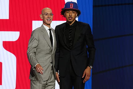 Jul 29, 2021; Brooklyn, New York, USA; Cade Cunningham (Oklahoma State) poses with NBA commissioner Adam Silver after being selected as the number one overall pick by the Detroit Pistons in the first round of the 2021 NBA Draft at Barclays Center. Mandatory Credit: Brad Penner-USA TODAY Sports