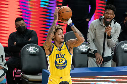 April 25, 2021; San Francisco, California, USA; Golden State Warriors guard Kelly Oubre Jr. (12) shoots the basketball against Sacramento Kings forward Maurice Harkless (8) during the third quarter at Chase Center. Mandatory Credit: Kyle Terada-USA TODAY Sports