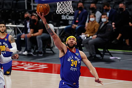 May 14, 2021; Detroit, Michigan, USA; Denver Nuggets center JaVale McGee (34) shoots in the second half against the Detroit Pistons at Little Caesars Arena. Mandatory Credit: Rick Osentoski-USA TODAY Sports
