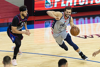 May 26, 2021; Philadelphia, Pennsylvania, USA; Washington Wizards guard Raul Neto (19) drives against Philadelphia 76ers guard Seth Curry (31) during the third quarter of game two in the first round of the 2021 NBA Playoffs at Wells Fargo Center. Mandatory Credit: Bill Streicher-USA TODAY Sports