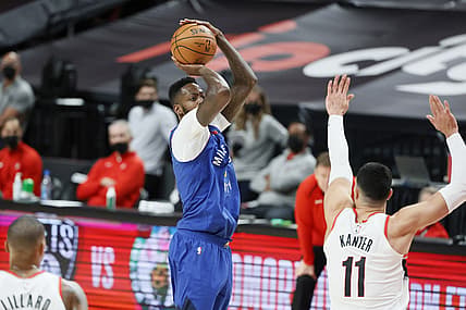 May 27, 2021; Portland, Oregon, USA; Denver Nuggets power forward JaMychal Green (0) shoots the ball over Portland Trail Blazers center Enes Kanter (11) during the first half of game three in the first round of the 2021 NBA Playoffs at Moda Center. Mandatory Credit: Soobum Im-USA TODAY Sports
