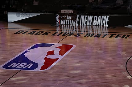 July 30, 2020; Lake Buena Vista, USA; A general view the court with Black Lives Matter written above the NBA logo is seen at center court prior to the game between the LA Clippers and the Los Angeles Lakers at The Arena at ESPN Wide World Of Sports Complex. Mandatory Credit: Mike Ehrmann/Pool Photo via USA TODAY Sports