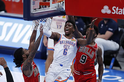 Dec 18, 2020; Oklahoma City, Oklahoma, USA; Oklahoma City Thunder guard Hamidou Diallo (6) goes to the basket between Chicago Bulls guard Coby White (0) and forward Patrick Williams (9) during the second half at Chesapeake Energy Arena. Mandatory Credit: Alonzo Adams-USA TODAY Sports
