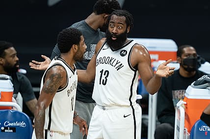 February 15, 2021; Sacramento, California, USA;  Brooklyn Nets guard James Harden (13, right) and guard Kyrie Irving (11, left) during the first quarter against the Sacramento Kings at Golden 1 Center. Mandatory Credit: Kyle Terada-USA TODAY Sports