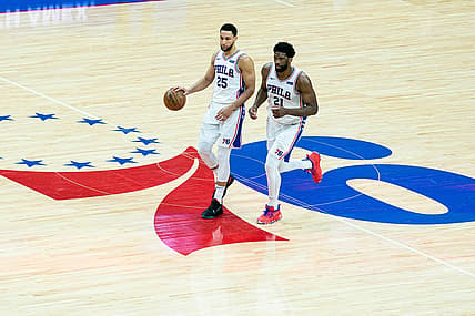 Jun 20, 2021; Philadelphia, Pennsylvania, USA; Philadelphia 76ers center Joel Embiid (21) and guard Ben Simmons (25) in action against the Atlanta Hawks during the second quarter of game seven of the second round of the 2021 NBA Playoffs at Wells Fargo Center. Mandatory Credit: Bill Streicher-USA TODAY Sports